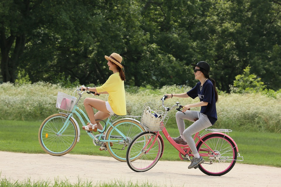 Two ladies on bikes