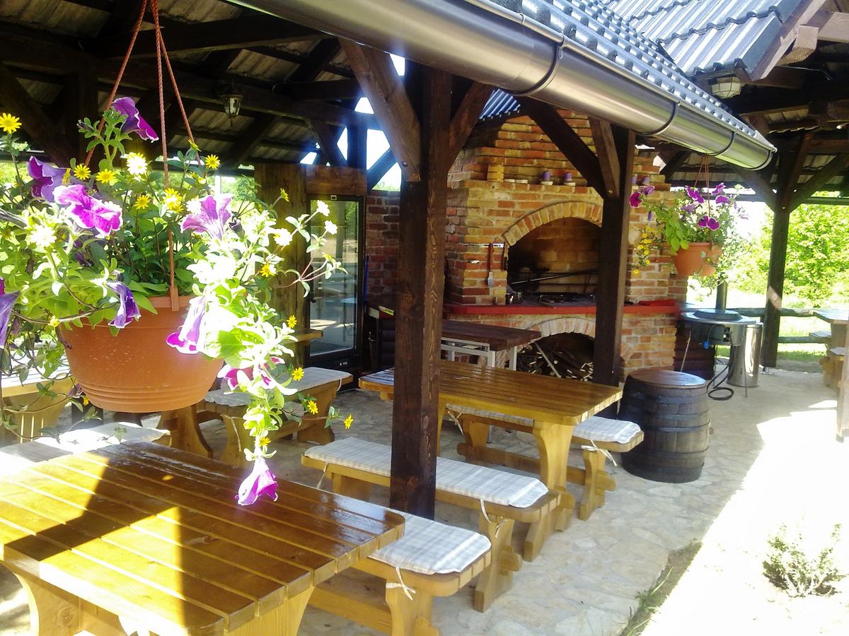 outside seating area, hanging flower baskets