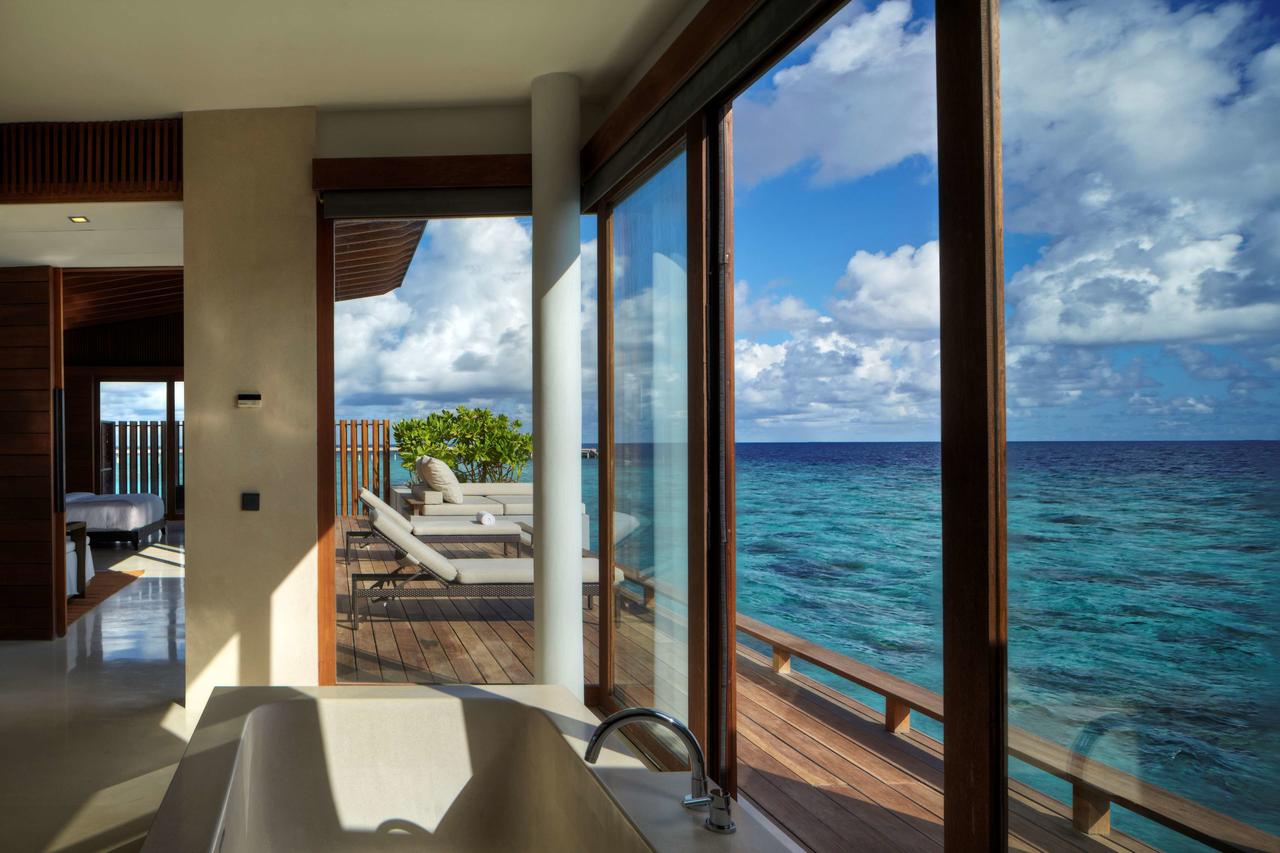 hotel room overlooking blue Maldives ocean