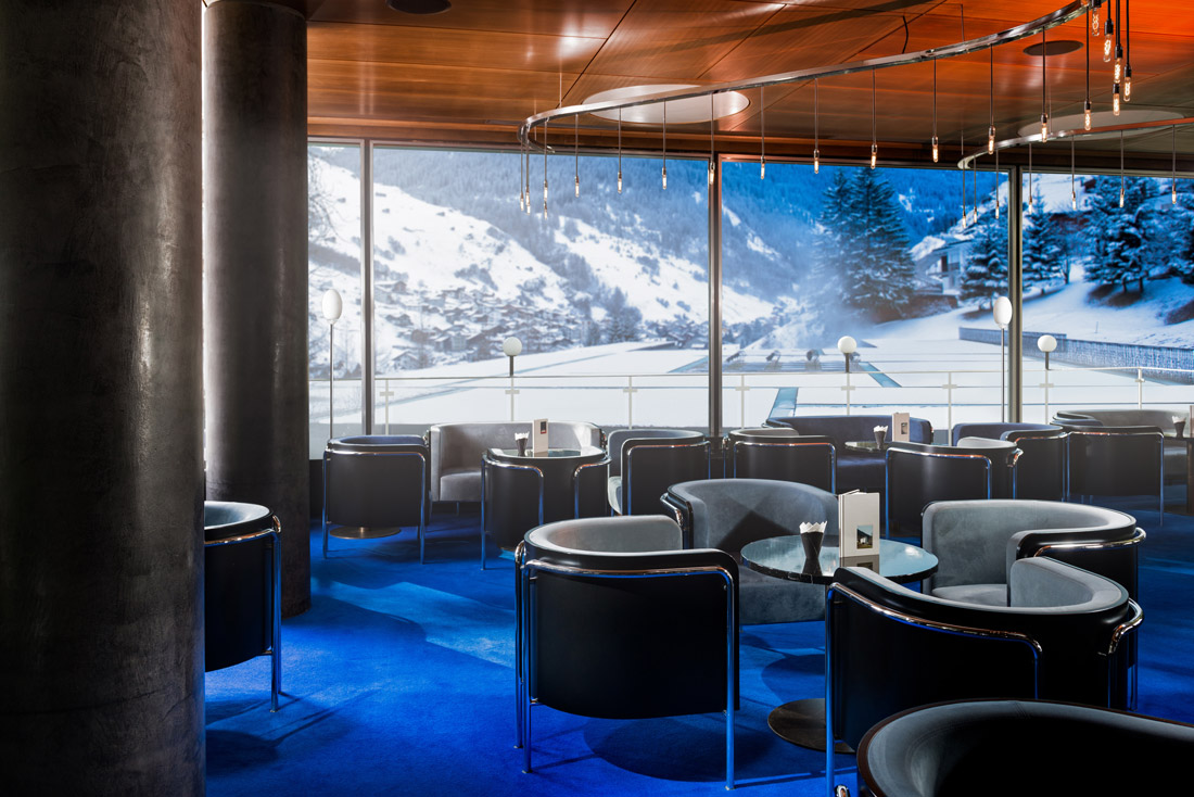 bright blue carpet, lounge, window with snowy vista