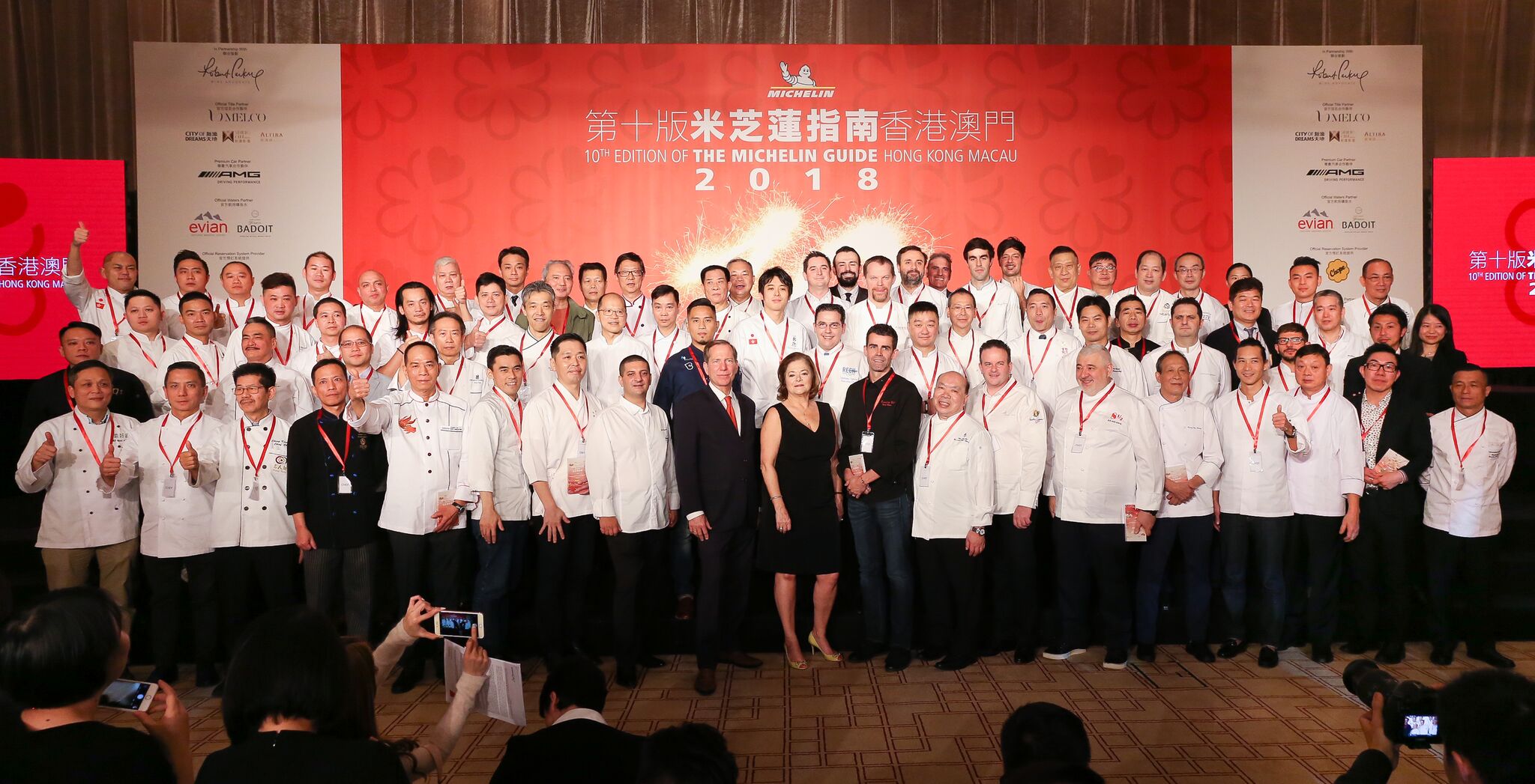 large group of chefs in white uniforms