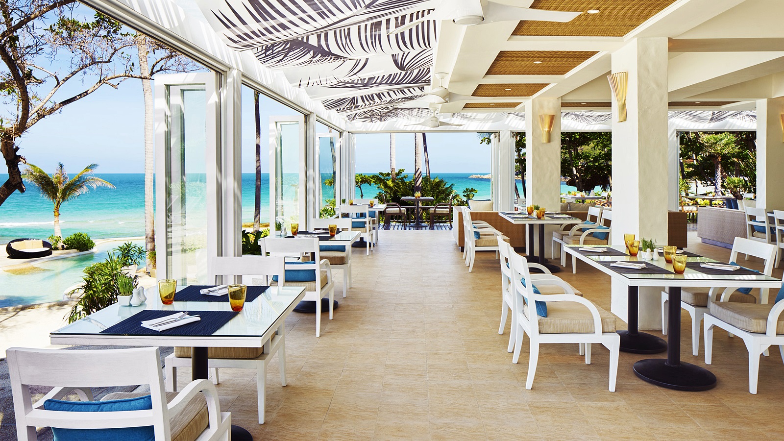 interior of restaurant with ocean in background