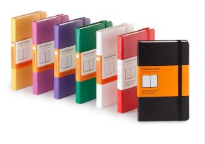 colourful notebooks in a row