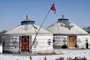 two white round yurts