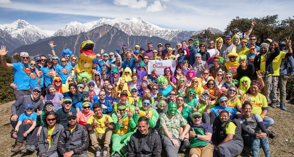 Group of people in the mountains for Just Challenge, in costume