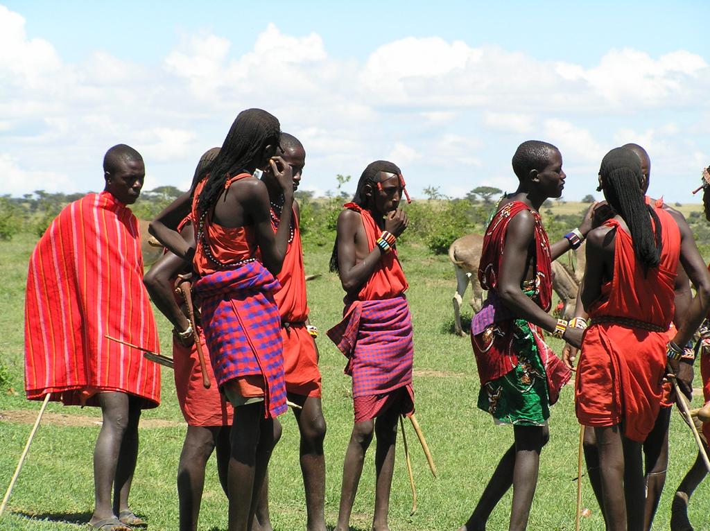 African Maasai warriors in red and pink wraps